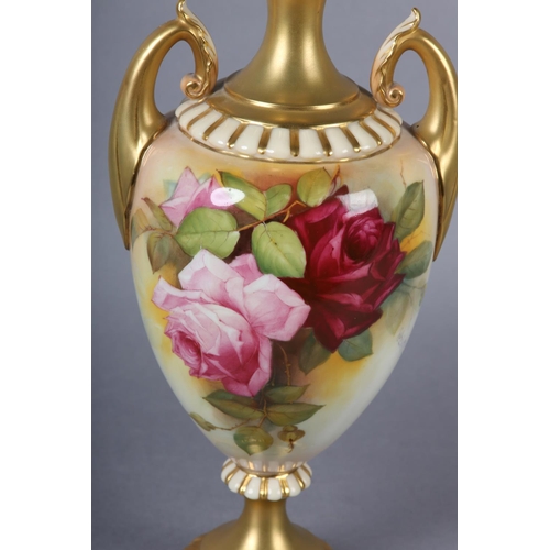 84 - A ROYAL WORCESTER URN-SHAPE VASE AND OVER PAINTED BY W H AUSTIN WITH RED AND PINK ROSES, signed the ... 