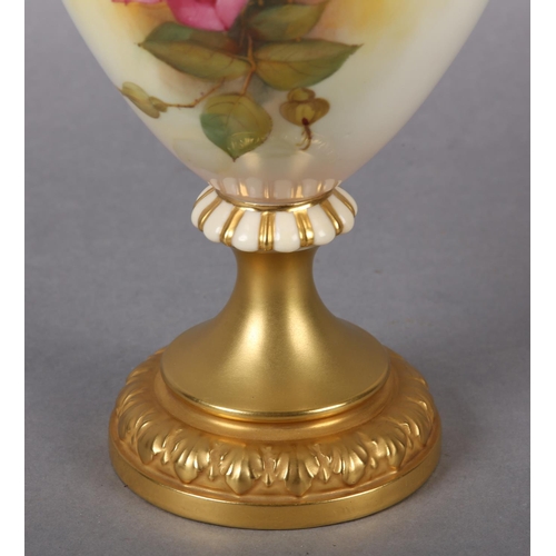 84 - A ROYAL WORCESTER URN-SHAPE VASE AND OVER PAINTED BY W H AUSTIN WITH RED AND PINK ROSES, signed the ... 