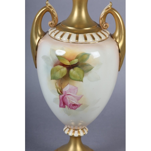 84 - A ROYAL WORCESTER URN-SHAPE VASE AND OVER PAINTED BY W H AUSTIN WITH RED AND PINK ROSES, signed the ... 