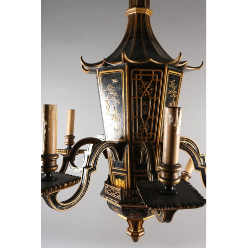 37 - A LACQUERED BLACK AND GILT EIGHT ARM ELECTROLIER, the main stem formed as a pagoda with sloping roof... 