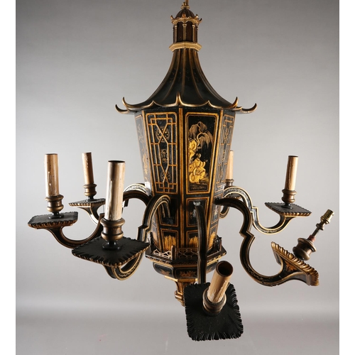 37 - A LACQUERED BLACK AND GILT EIGHT ARM ELECTROLIER, the main stem formed as a pagoda with sloping roof... 