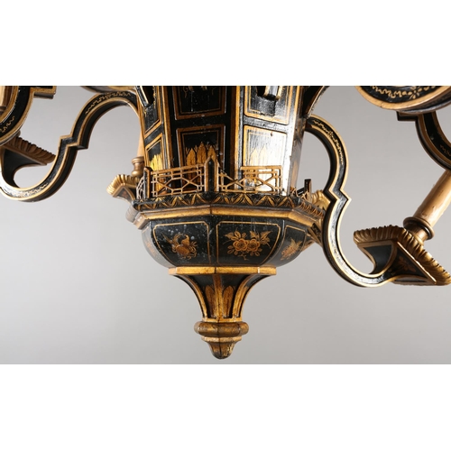 37 - A LACQUERED BLACK AND GILT EIGHT ARM ELECTROLIER, the main stem formed as a pagoda with sloping roof... 