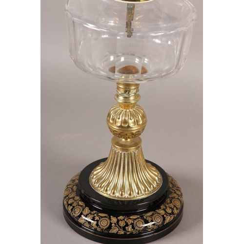 40B - A VICTORIAN BRASS OIL LAMP, having an etched and turquoise frilled shade, with a glass reservoir on ... 