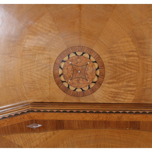 423 - AN ART DECO WALNUT, EBONY AND ROSEWOOD INLAID BEDROOM SUITE of radiating veneers centred with concen... 