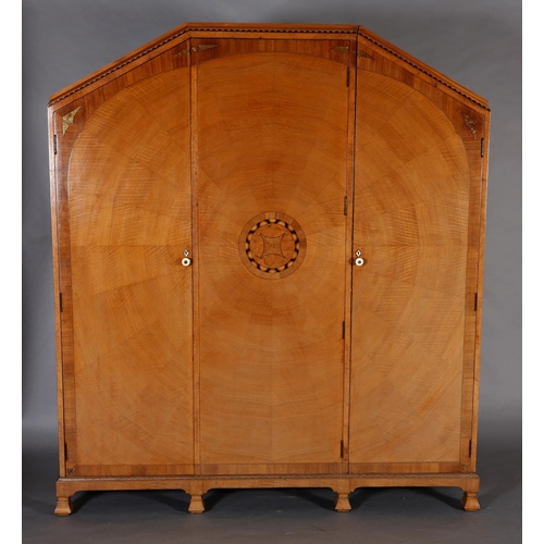 423 - AN ART DECO WALNUT, EBONY AND ROSEWOOD INLAID BEDROOM SUITE of radiating veneers centred with concen... 