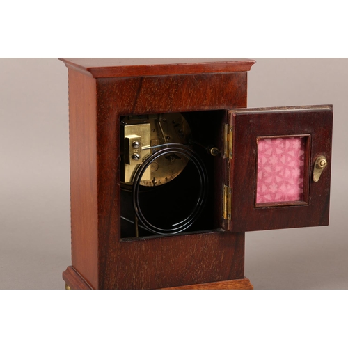 51 - AN EDWARD VII MAHOGANY MANTEL CLOCK INLAID WITH BOXWOOD AND EBONY STRINGING, having a French 8-day m... 