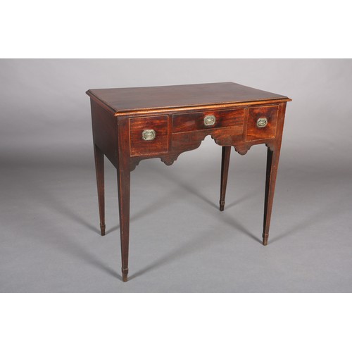 377 - A LATE GEORGE III MAHOGANY SIDE TABLE, the ogee arched apron fitted with three small drawers inlaid ... 