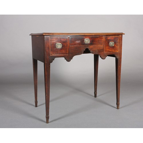 377 - A LATE GEORGE III MAHOGANY SIDE TABLE, the ogee arched apron fitted with three small drawers inlaid ... 