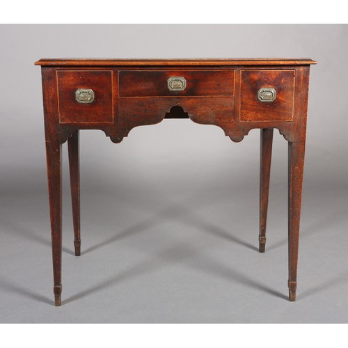 377 - A LATE GEORGE III MAHOGANY SIDE TABLE, the ogee arched apron fitted with three small drawers inlaid ... 