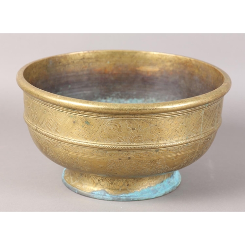 126 - A CHINESE BRASS BOWL, the annulated body engraved with reserves of peony and diaper cell on foot rim... 