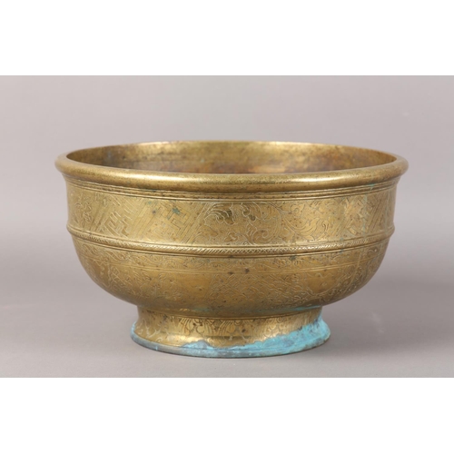 126 - A CHINESE BRASS BOWL, the annulated body engraved with reserves of peony and diaper cell on foot rim... 