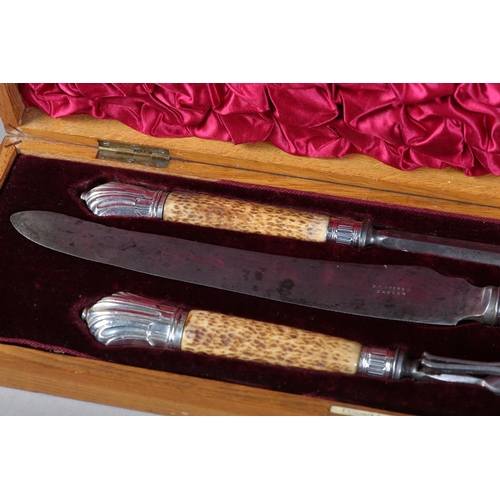 A LATE VICTORIAN SILVER MOUNTED ANTLER HANDLE CARVING SET by F T