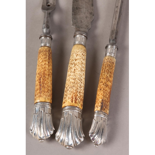 A LATE VICTORIAN SILVER MOUNTED ANTLER HANDLE CARVING SET by F T