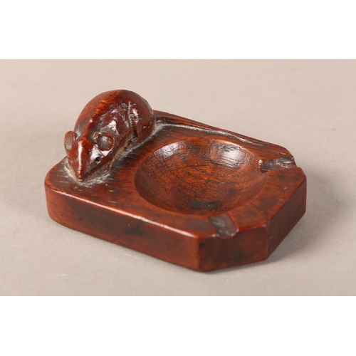 346 - THOMPSON OF KILBURN 'MOUSEMAN', an early oak ashtray carved in high relief with a mouse, of rich col... 