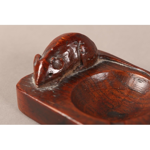 346 - THOMPSON OF KILBURN 'MOUSEMAN', an early oak ashtray carved in high relief with a mouse, of rich col... 