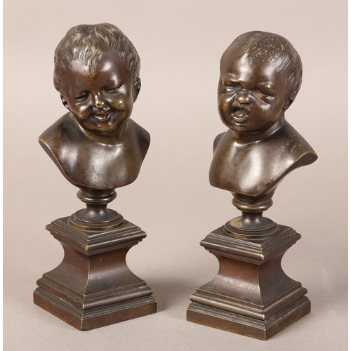 56 - A PAIR OF LATE 19TH CENTURY BRONZE BUSTS OF INFANTS, after Messerschmidt (1736-1783), one laughing, ... 