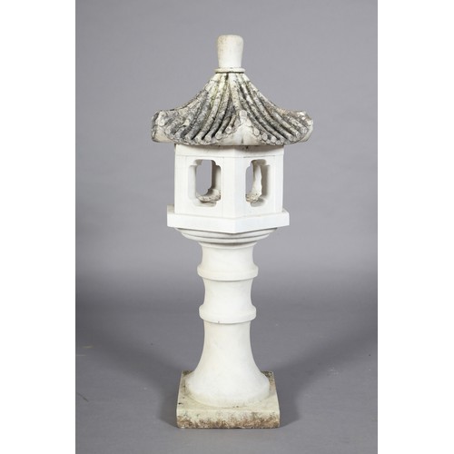 108 - A WHITE MARBLE GARDEN JAPANESE LANTERN with carved titled pagoda hood, the hexagonal body with quatr... 