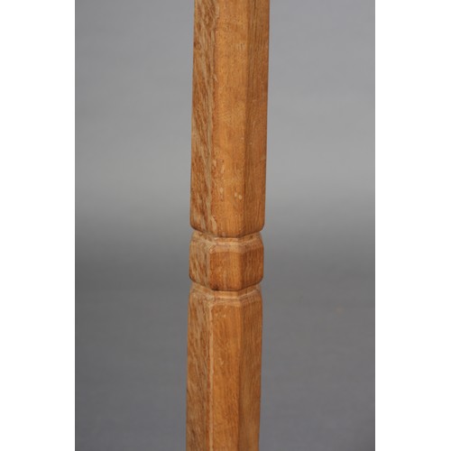 351 - A THOMPSON OF KILBURN 'MOUSEMAN', an oak standard lamp, the tapered column on an octagonal stepped b... 