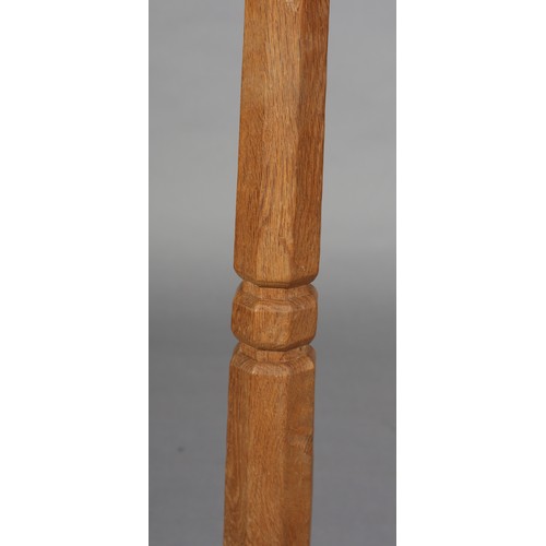 352 - A THOMPSON OF KILBURN 'MOUSEMAN', an oak standard lamp, the tapered column on an octagonal stepped b... 