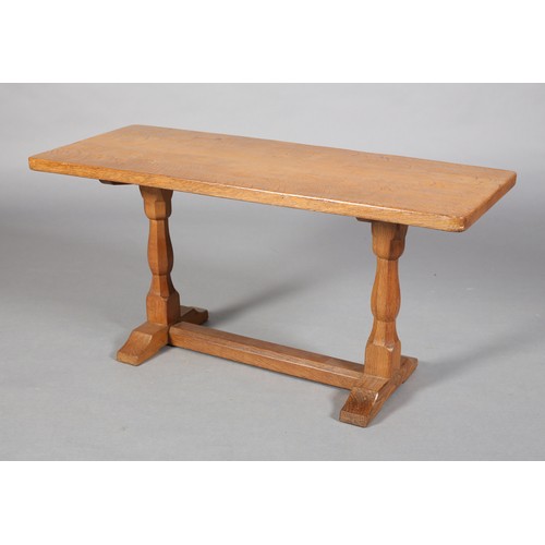 356 - AN OAK COFFEE TABLE, Eagleman, rectangular, on octagonal turned refectory standards joined by a plat... 