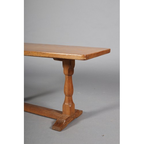 356 - AN OAK COFFEE TABLE, Eagleman, rectangular, on octagonal turned refectory standards joined by a plat... 