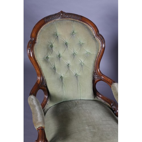 357 - A PAIR OF VICTORIAN WALNUT GENTLEMAN'S ARMCHAIR AND LADY'S CHAIR,  each having an encircling frame w... 