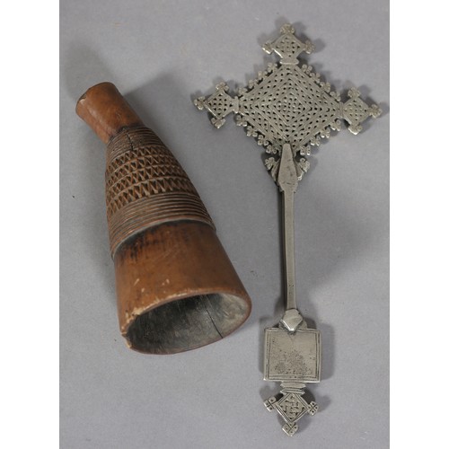 12 - AN ETHIOPIAN WHITE METAL COPTIC CROSS, 27cm high and a late 19th century African hardwood pipe bowl ... 