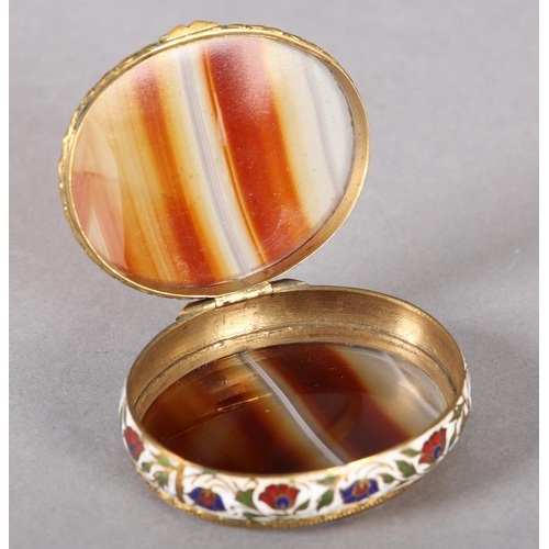 39 - A late 19th century french banded agate gilt metal and champlevé enamel box of oval outline, 6.25cm ... 