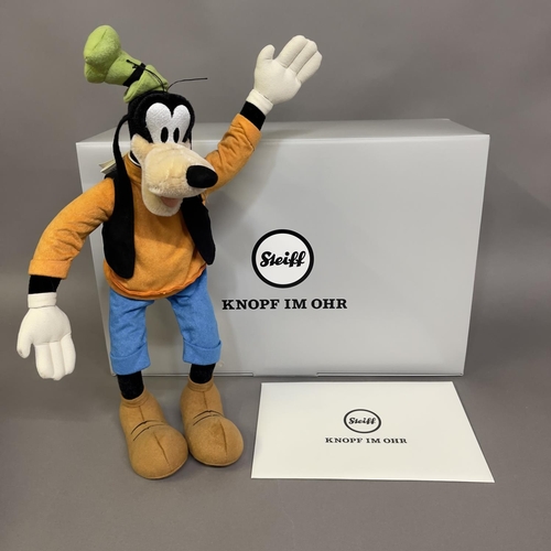 144 - A Steiff mohair plush figure of Disney’s cartoon character ‘Goofy’, number 110 of 2000, 36cm high, b... 