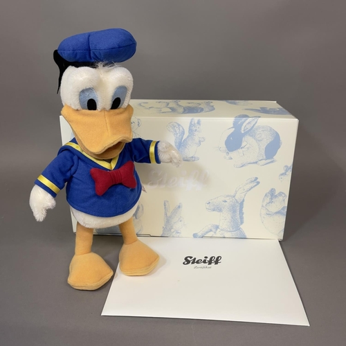 148 - A Steiff mohair plush figure Disney’s cartoon character ‘Donald Duck’, number 700 of 2000, 25cm high... 