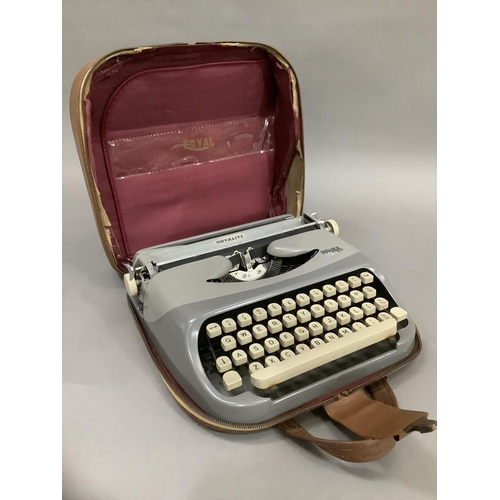 120 - A vintage typewriter by Royalite in two tone grey metal frame and with carrying case