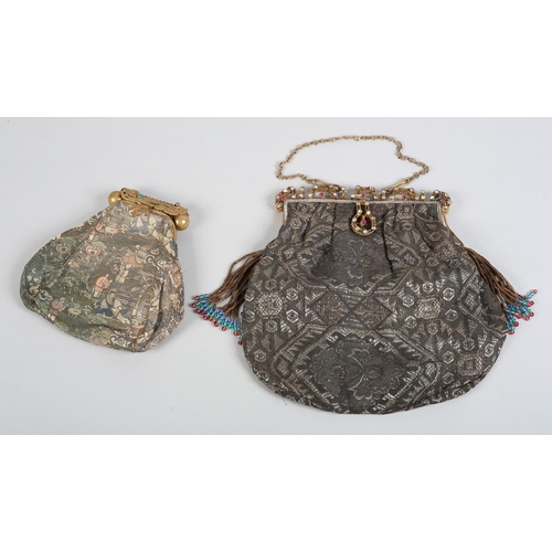 235 - Two early 20th century lamé evening bags, the first with elaborate metal frame inset with stones, ch... 