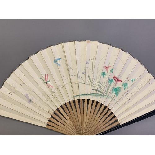 28 - Three 20th century fans: the first, in white mother of pearl, a pastiche of an 18th century fan, the... 