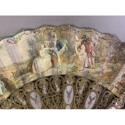 28 - Three 20th century fans: the first, in white mother of pearl, a pastiche of an 18th century fan, the... 