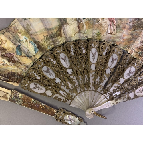 28 - Three 20th century fans: the first, in white mother of pearl, a pastiche of an 18th century fan, the... 