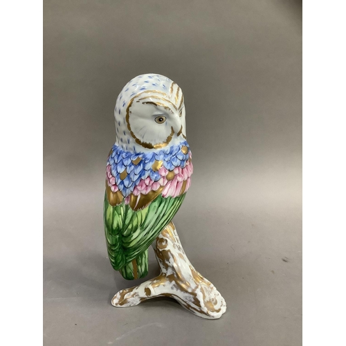 12 - A Herend style china figure of an owl perched on a branch by Vista Alegre, Portugal, painted by hand... 