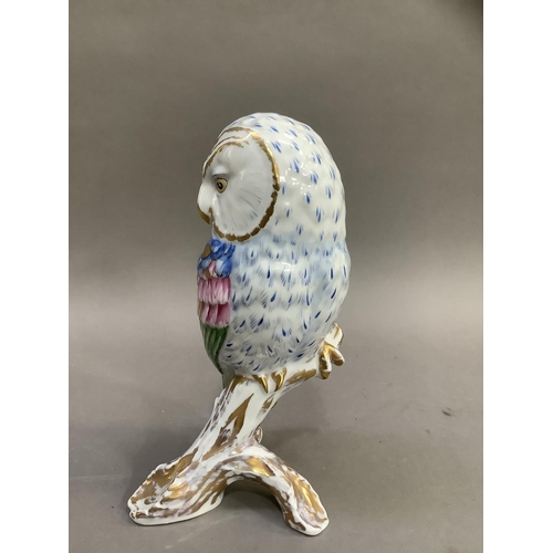 12 - A Herend style china figure of an owl perched on a branch by Vista Alegre, Portugal, painted by hand... 