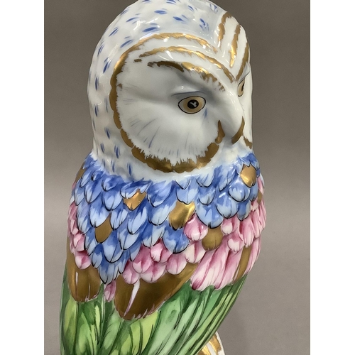 12 - A Herend style china figure of an owl perched on a branch by Vista Alegre, Portugal, painted by hand... 