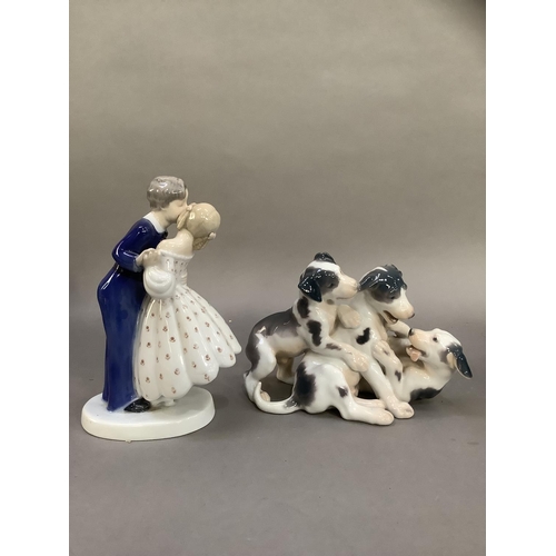 70 - A Bing and Grondahl figure group of three playing terrier pups, no.1815 together with another figure... 