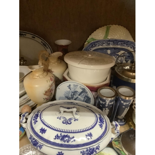 108 - A collection of ceramics comprising pink floral graduated meat plates, blue and white plates, blue a... 