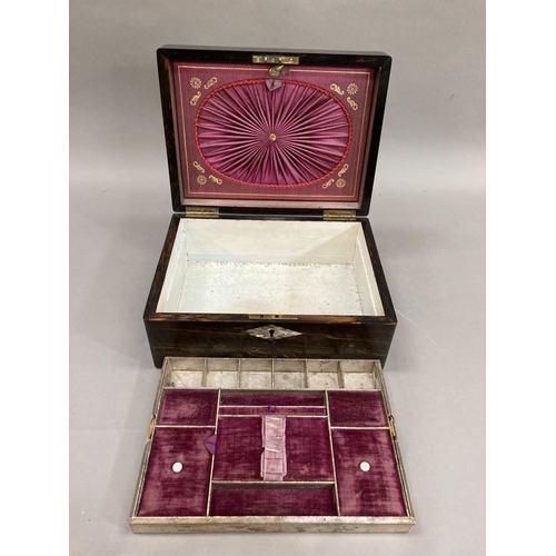 23 - A 19th century coromandel  work box inlaid with abalone cartouche and escutcheon, the interior lined... 