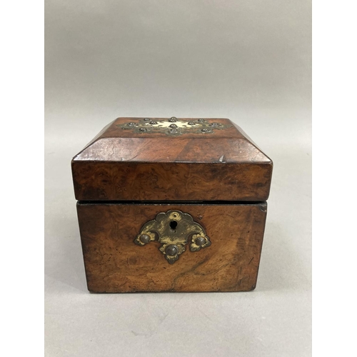 3 - A 19th century walnut tea caddy having cut gilded metal and ivory applied cartouche and gilt metal e... 