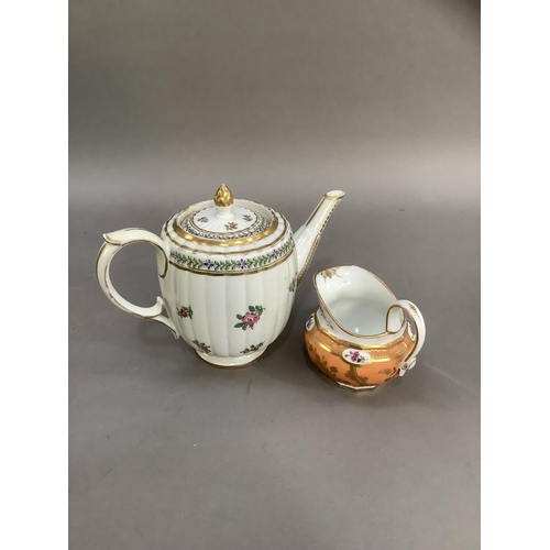 36 - An 18th century teapot, the lid having an acorn gilt finial, the fluted body of barrel shape painted... 