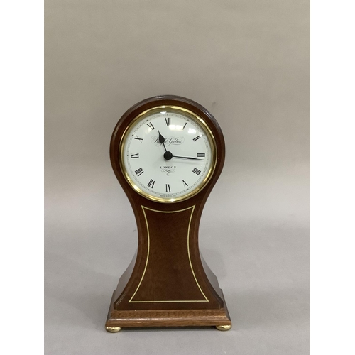 4 - A reproduction, mahogany balloon clock having a white enamelled dial signed Knight and Gibbins, Lond... 