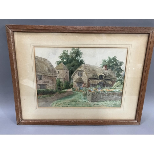 481 - Phillip Kilner, Thatched cottages and garden, watercolour, signed to lower right, 25cm x 35cm