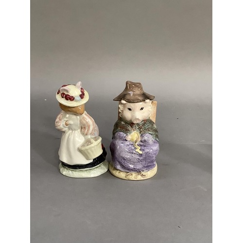 71 - A collection of Beatrix potter figures by Royal Doulton and Royal Albert including Mr Toad Flax, Lad... 