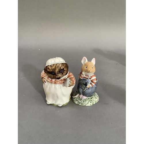 71 - A collection of Beatrix potter figures by Royal Doulton and Royal Albert including Mr Toad Flax, Lad... 