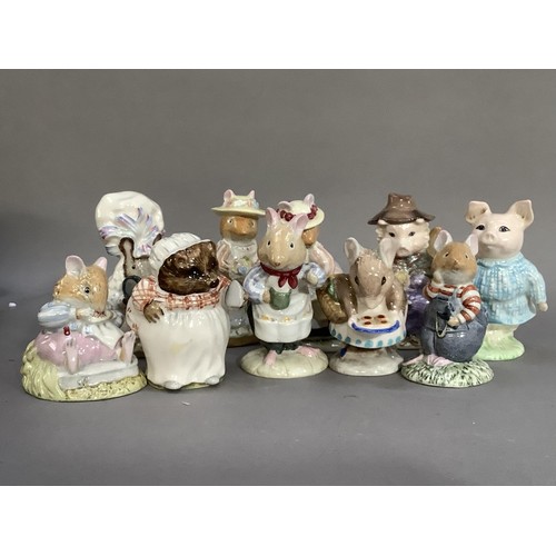 71 - A collection of Beatrix potter figures by Royal Doulton and Royal Albert including Mr Toad Flax, Lad... 