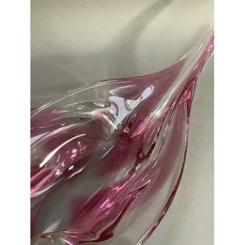 87 - A 1970s studio  tinted pink and clear glass dish of elongated form, 63cm wide