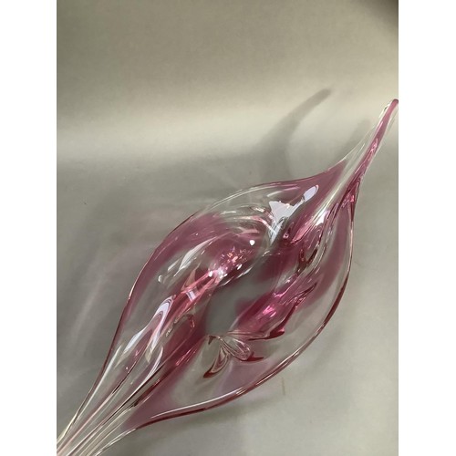 87 - A 1970s studio  tinted pink and clear glass dish of elongated form, 63cm wide